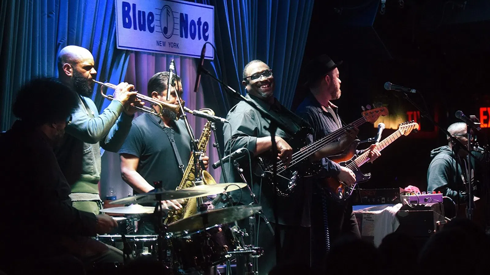 a group of people playing instruments