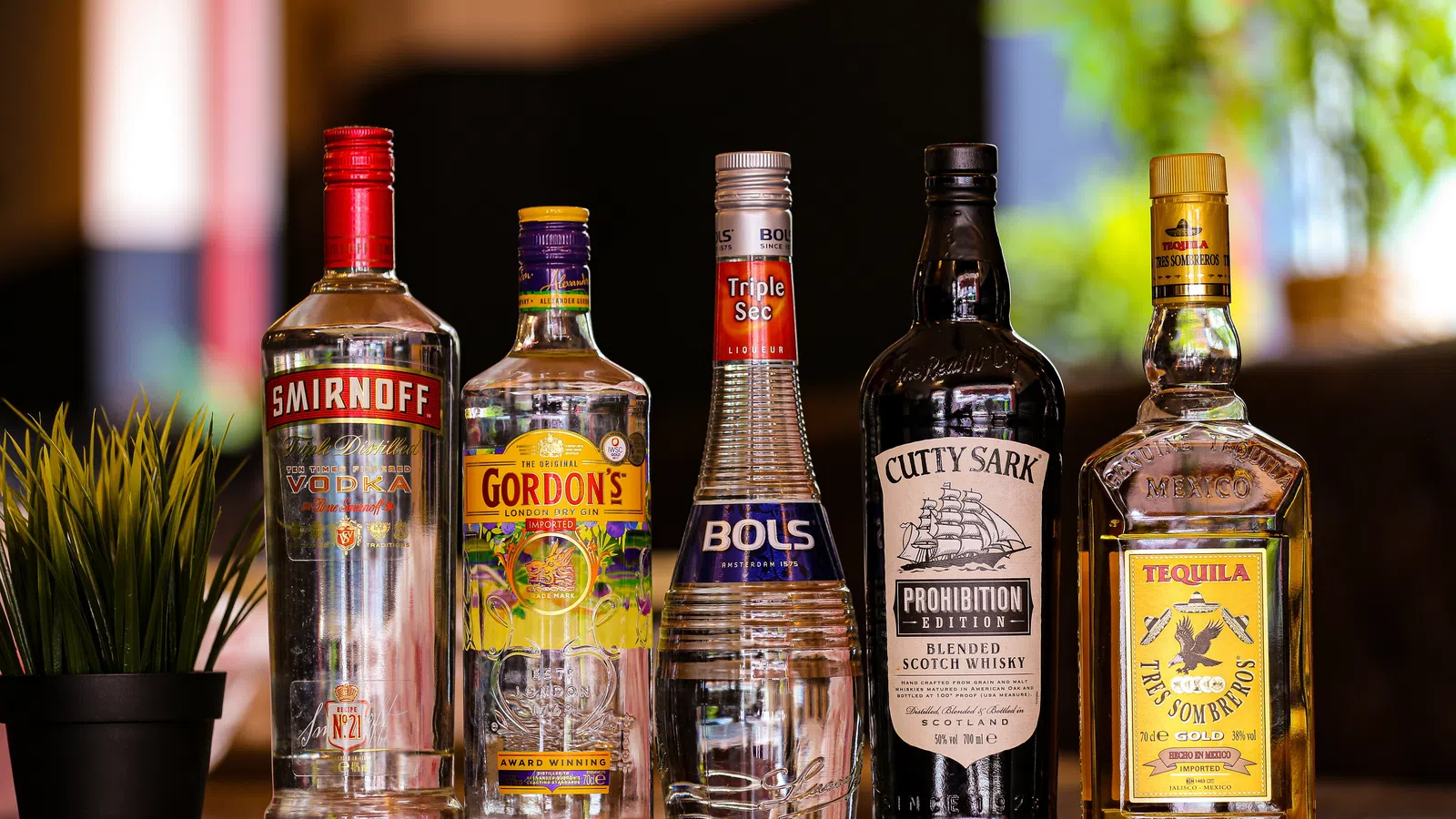 a group of bottles with liquid in them