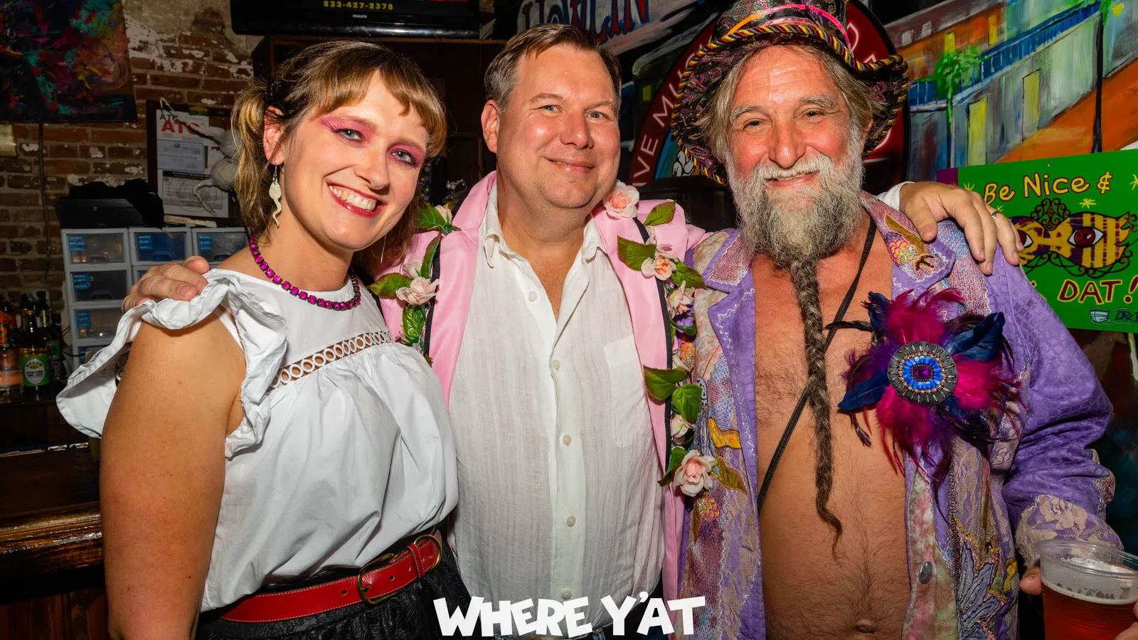 a group of people posing for the camera