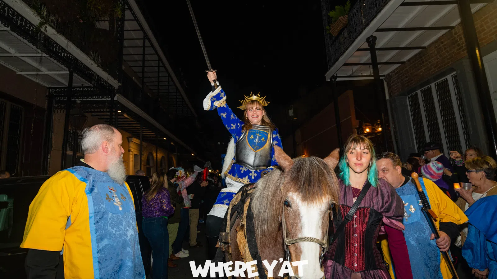a man riding a horse with a woman on the back