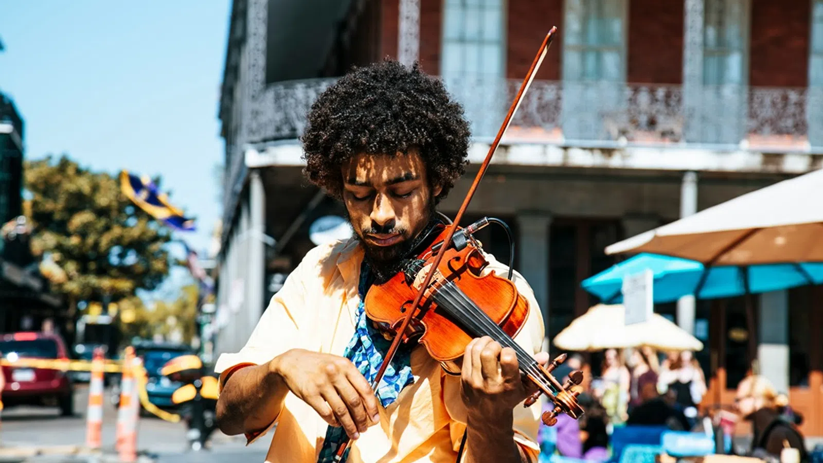 a man playing a violin