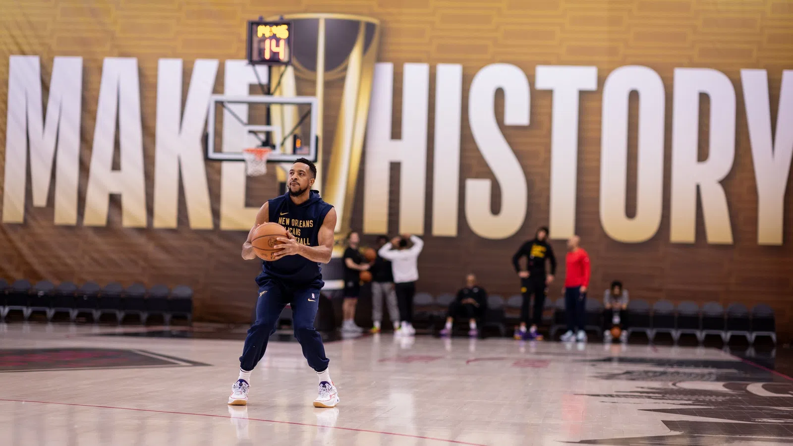 a person holding a basketball
