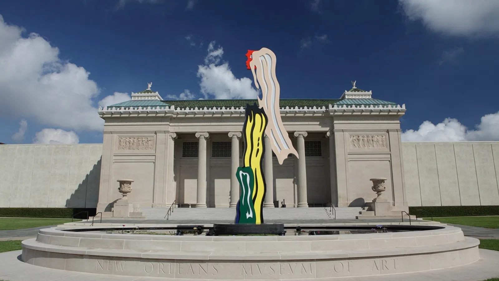 New Orleans Museum of Art with a large statue in front of it