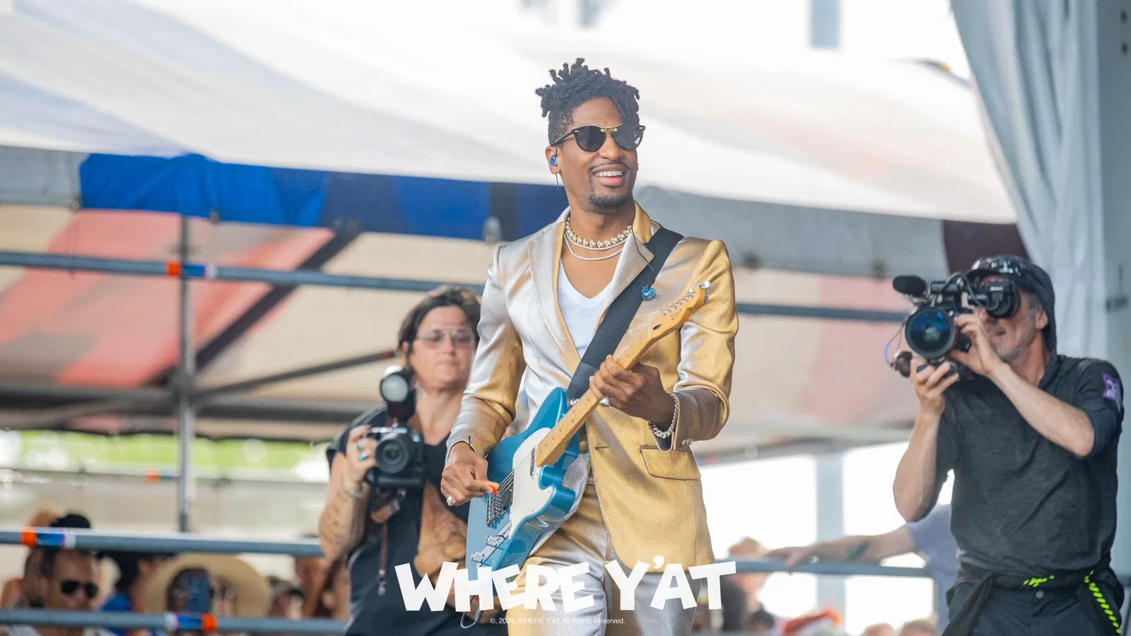 Jonathan Batiste holding a camera