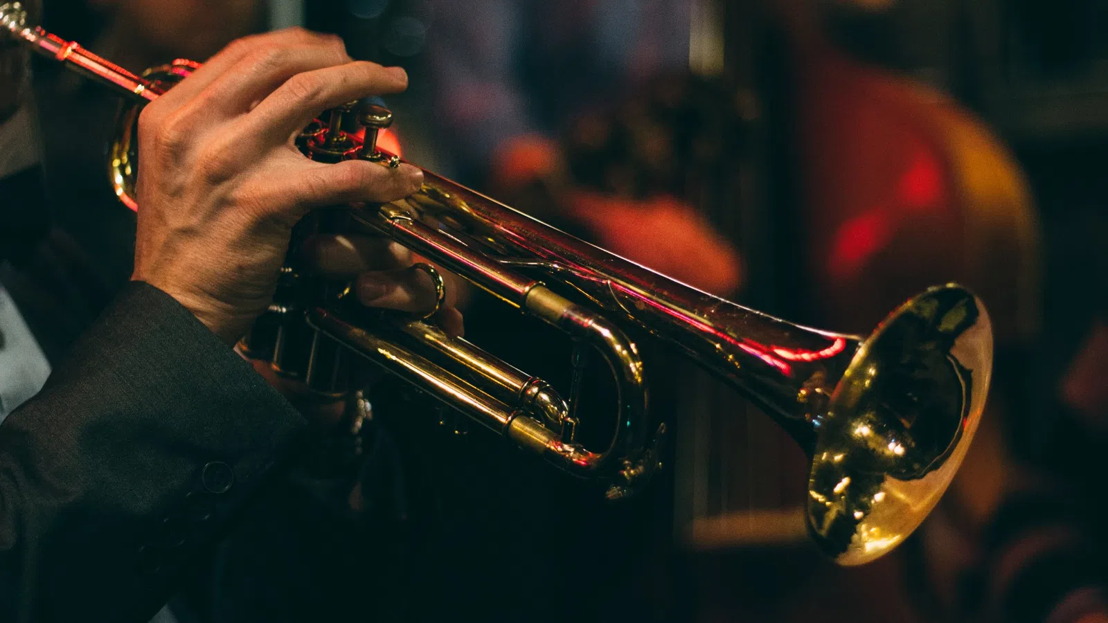 a person playing a trumpet