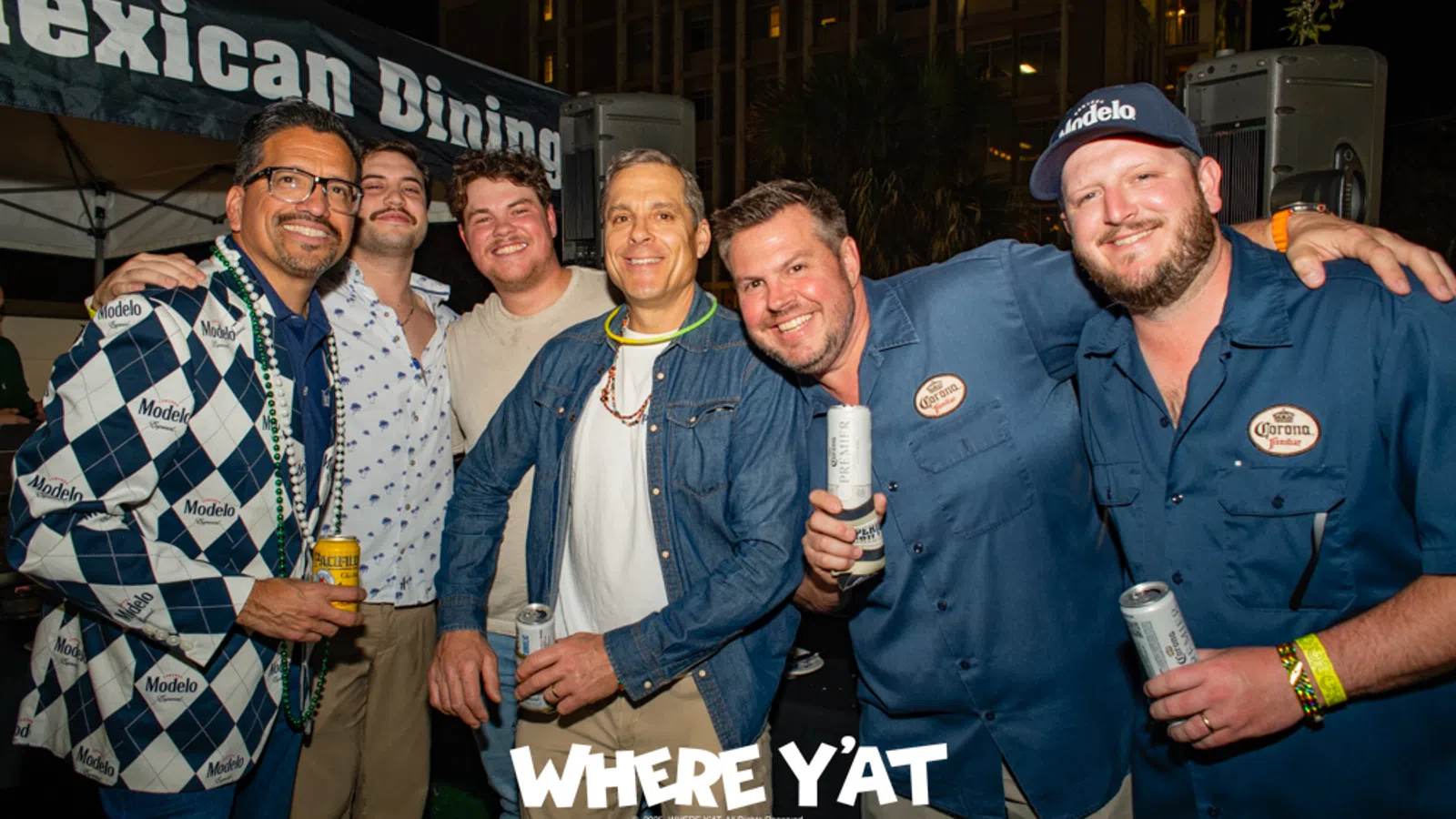 a group of men posing for a photo