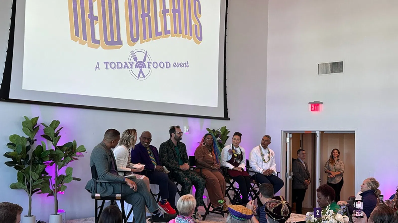 a group of people sitting in a room