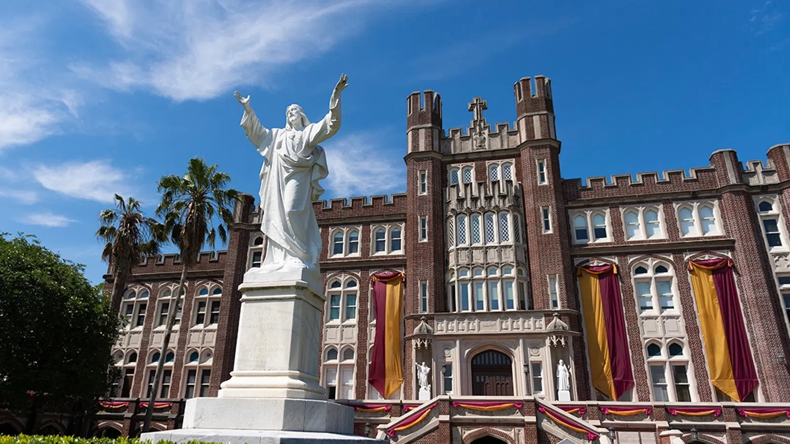 a statue in front of a building