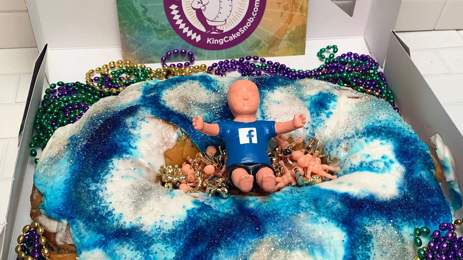 King Cake Snob Delivers a Fully Dressed King Cake Baby to Facebook?s Zuckerburg