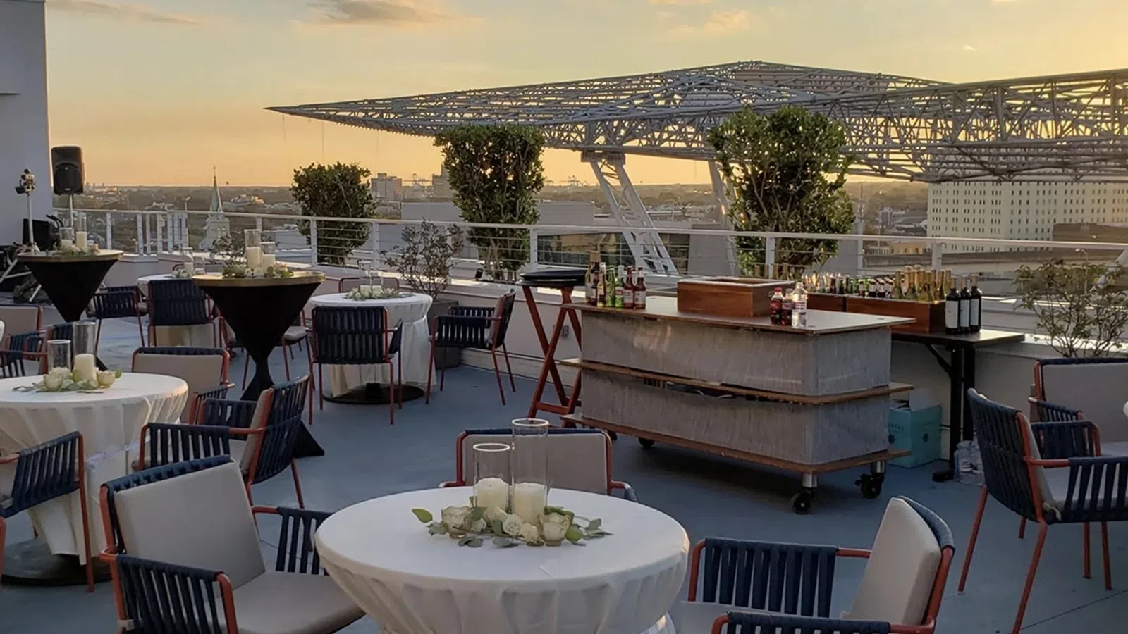 a group of tables and chairs outside