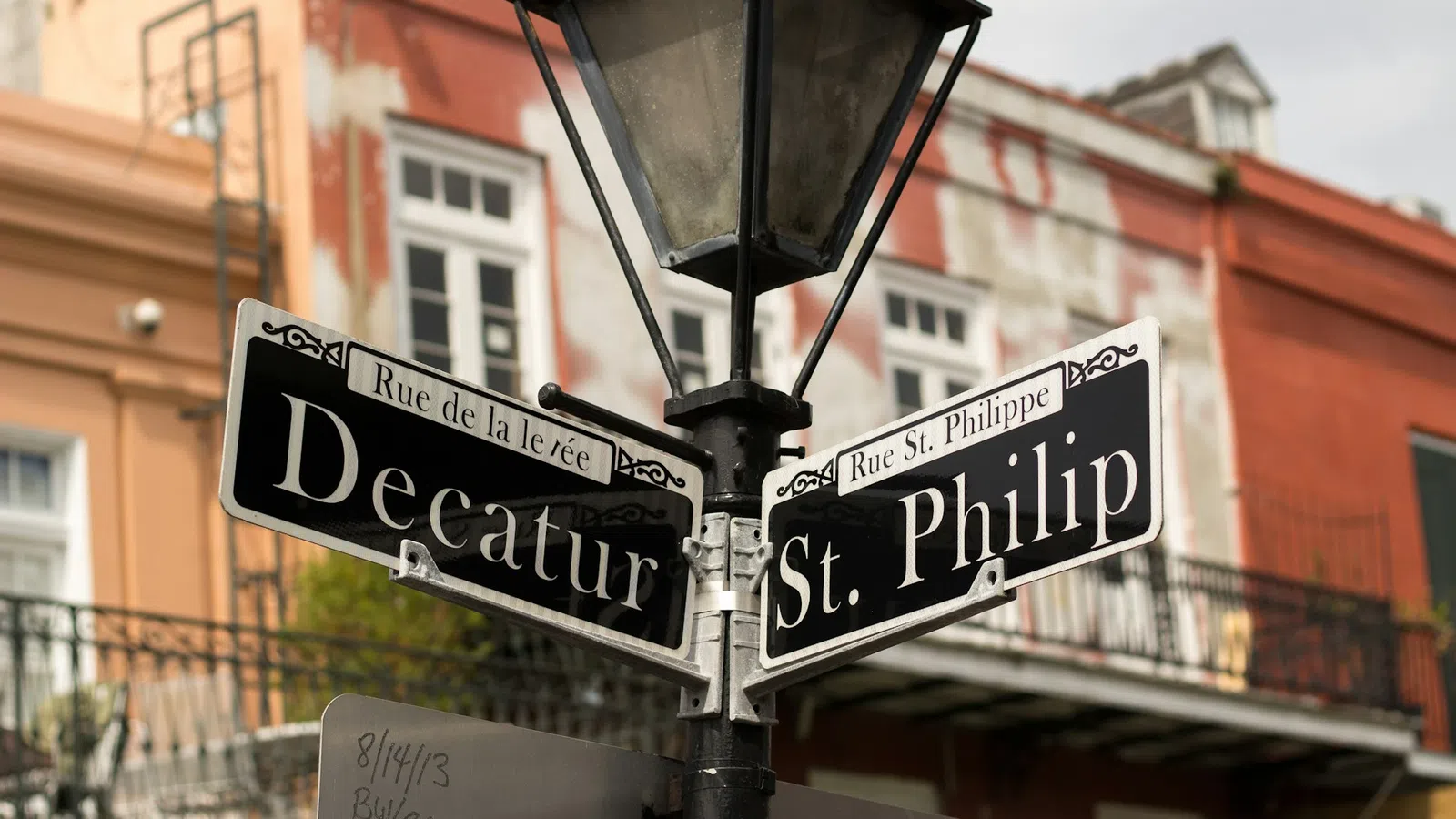 a street sign is posted on a pole