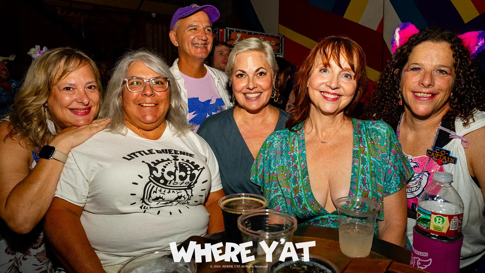 a group of people posing for a photo