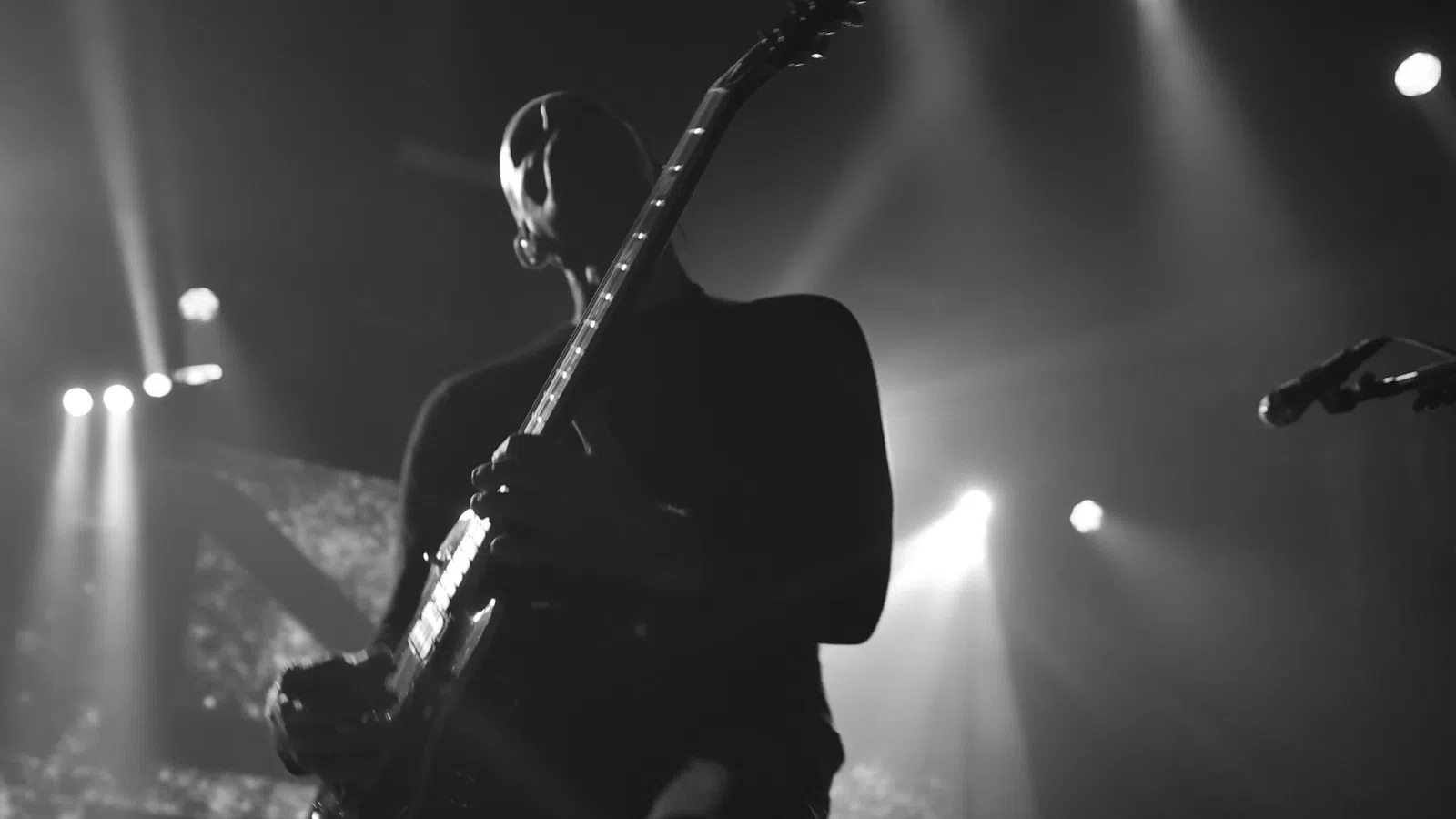 a person playing a guitar