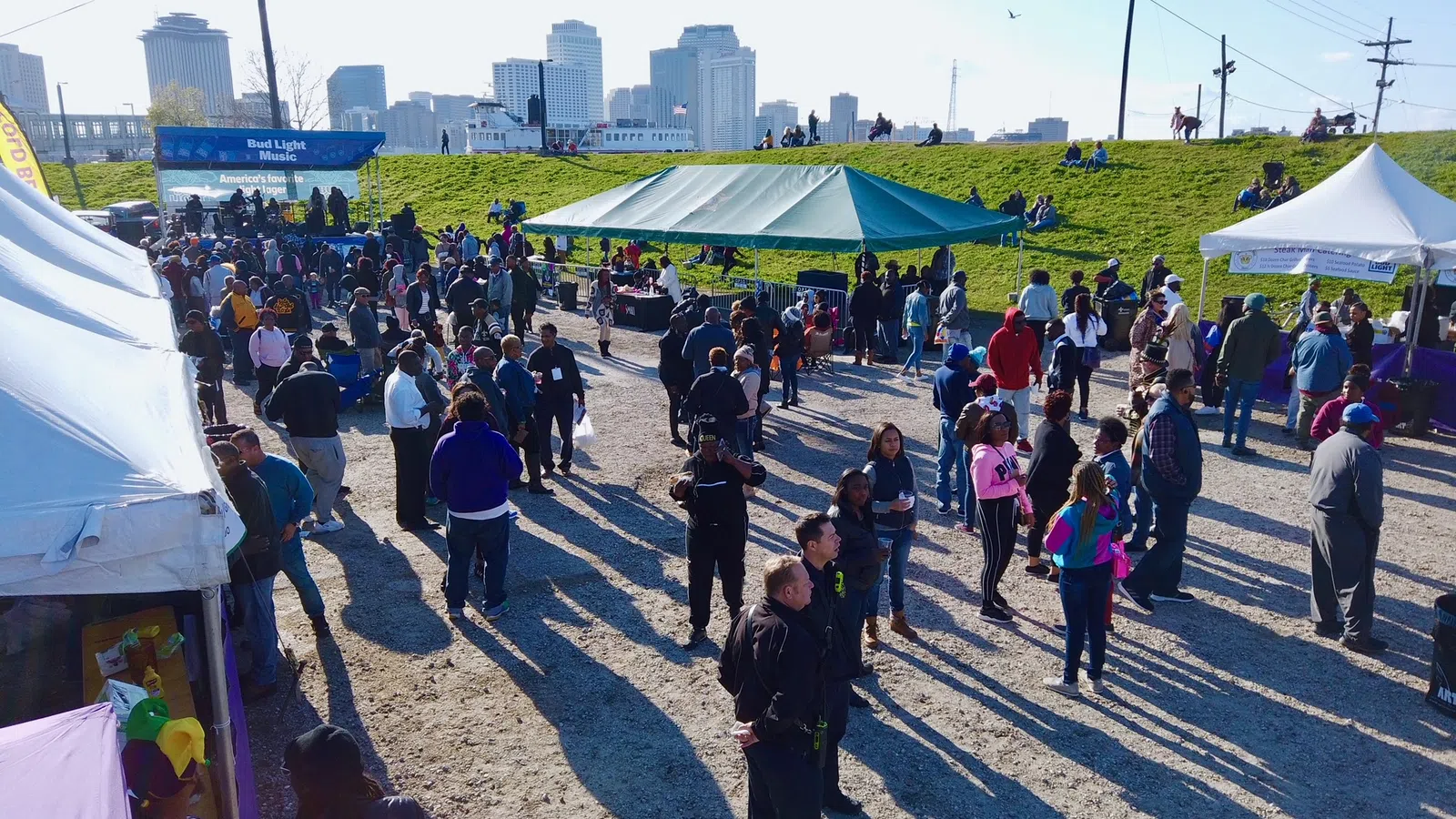 a large crowd of people at an outdoor event