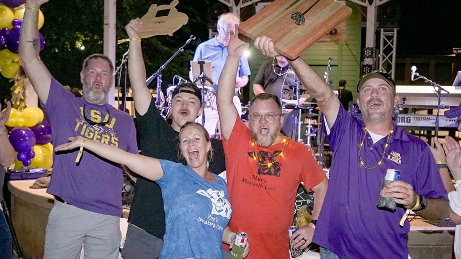 a group of people posing for a photo