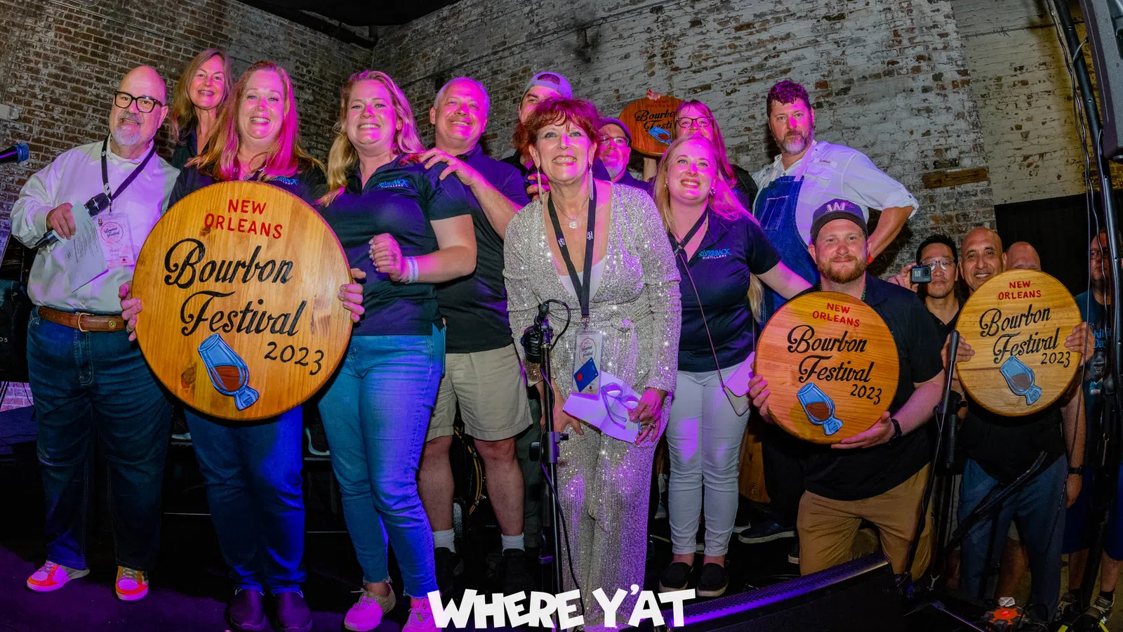 a group of people posing for a photo