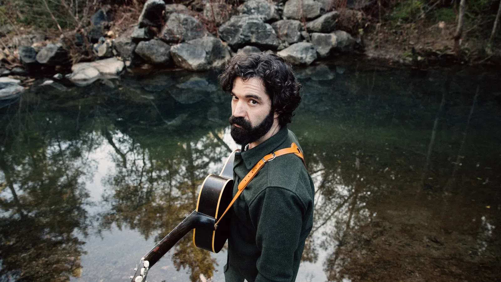 Andrew Duhon standing in a river