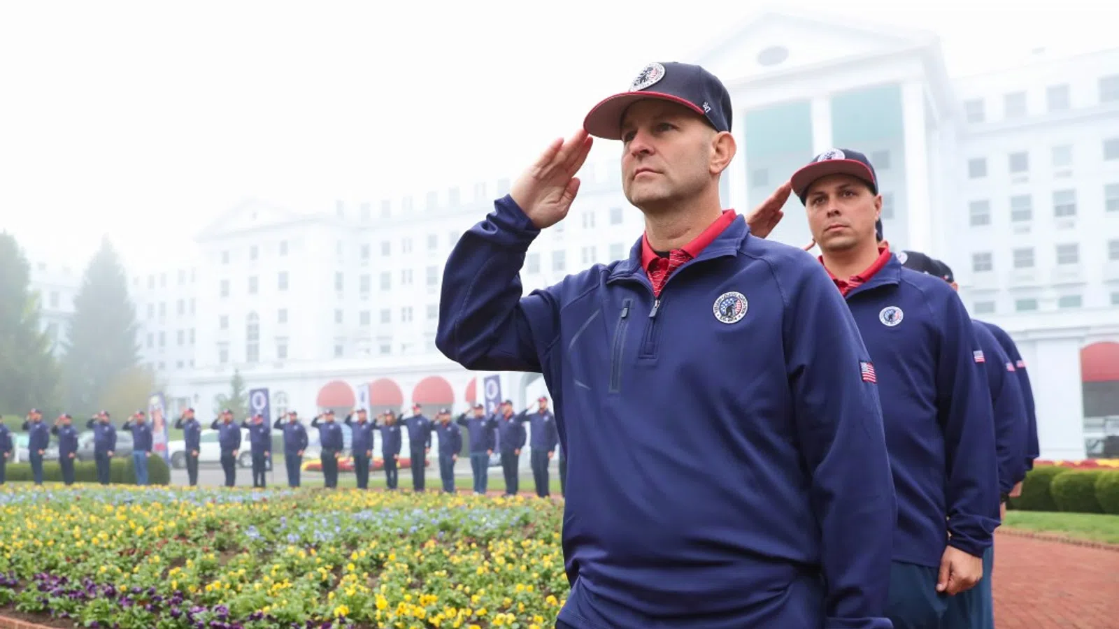a man in a uniform saluting