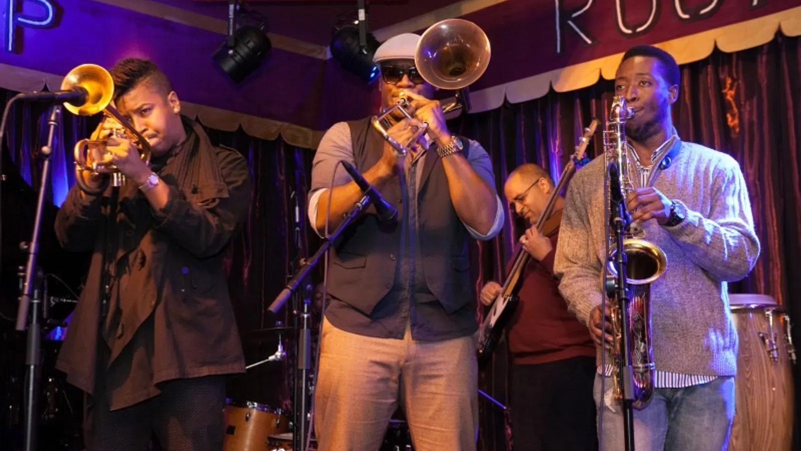 a group of men playing instruments