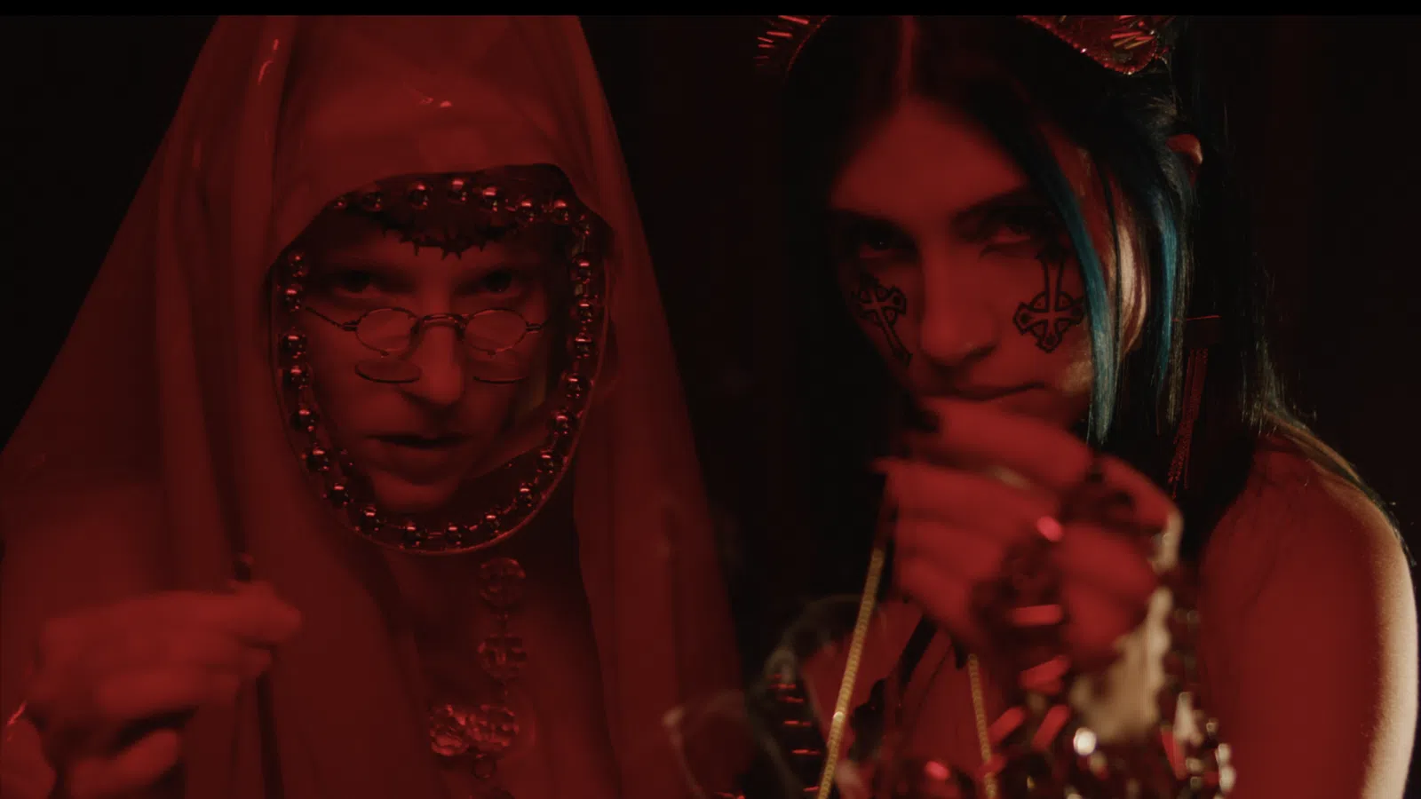 a couple of people with paint on their faces