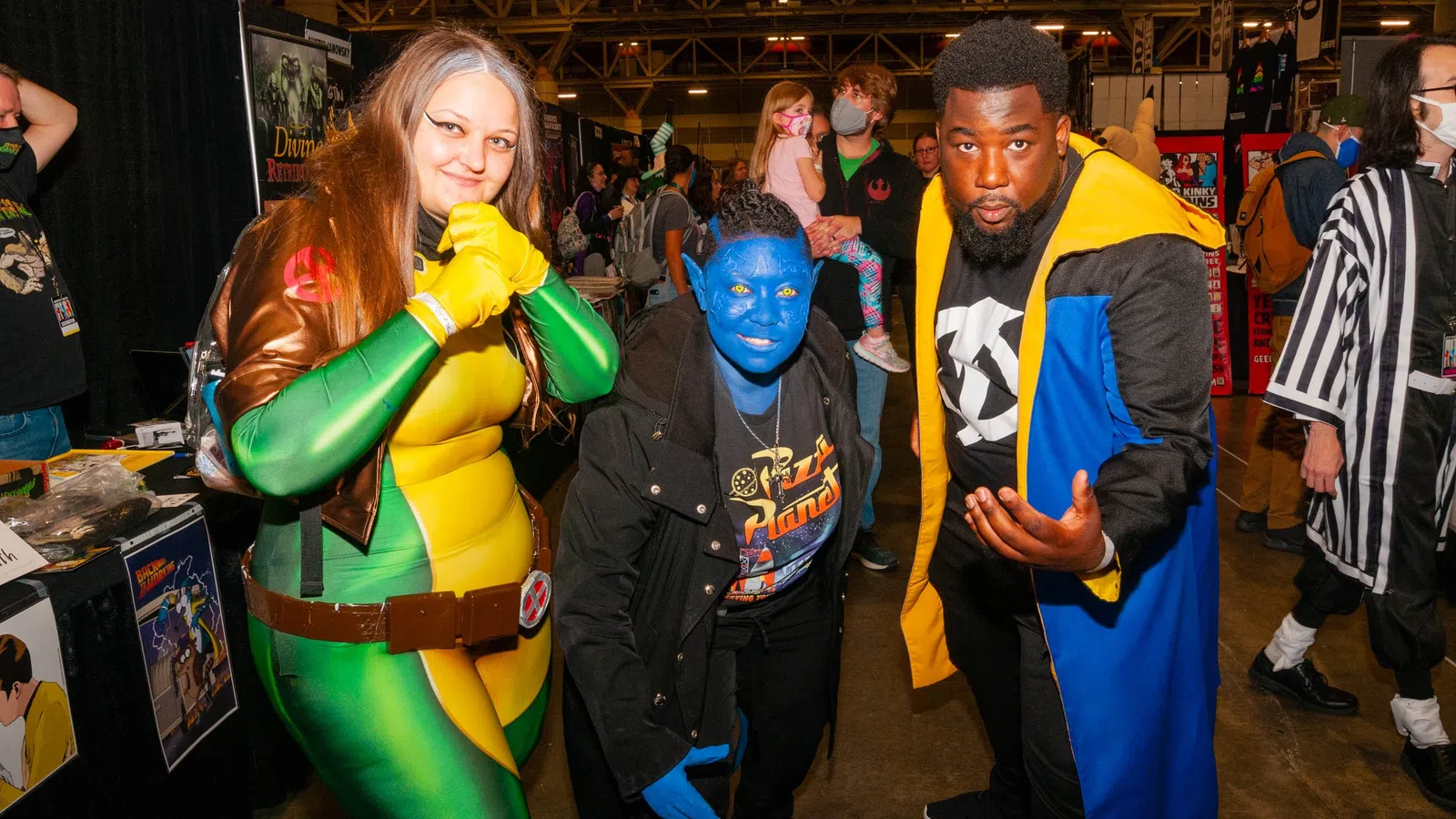 a group of people dressed up in clothing