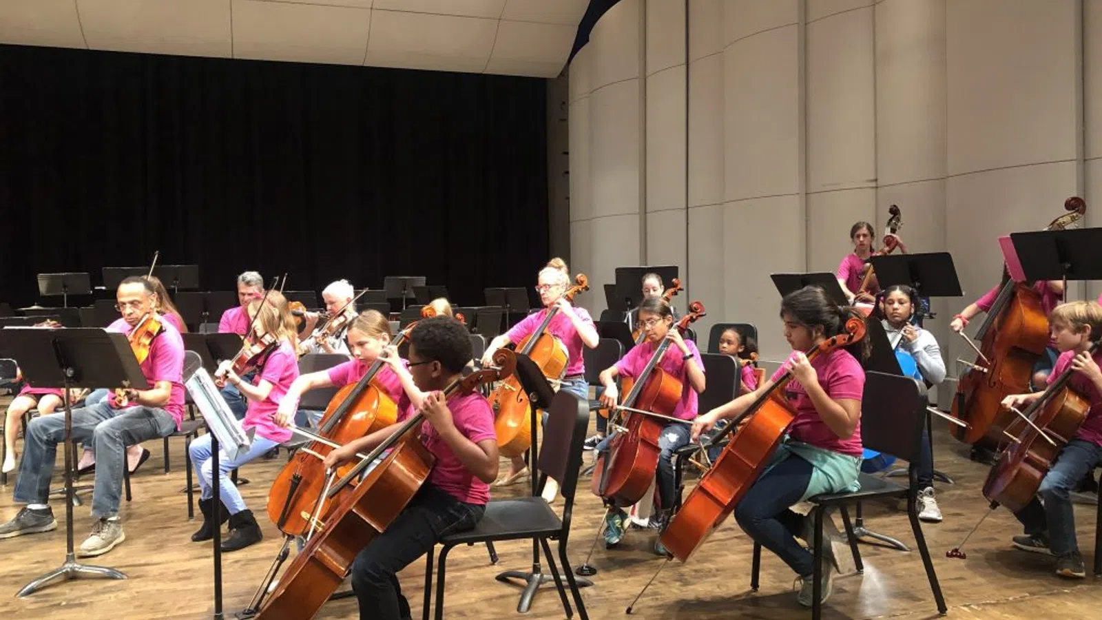 a group of people playing instruments