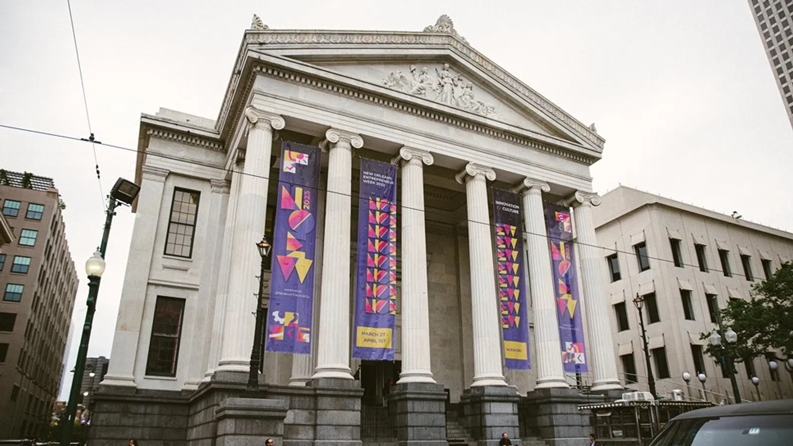a building with columns and a staircase