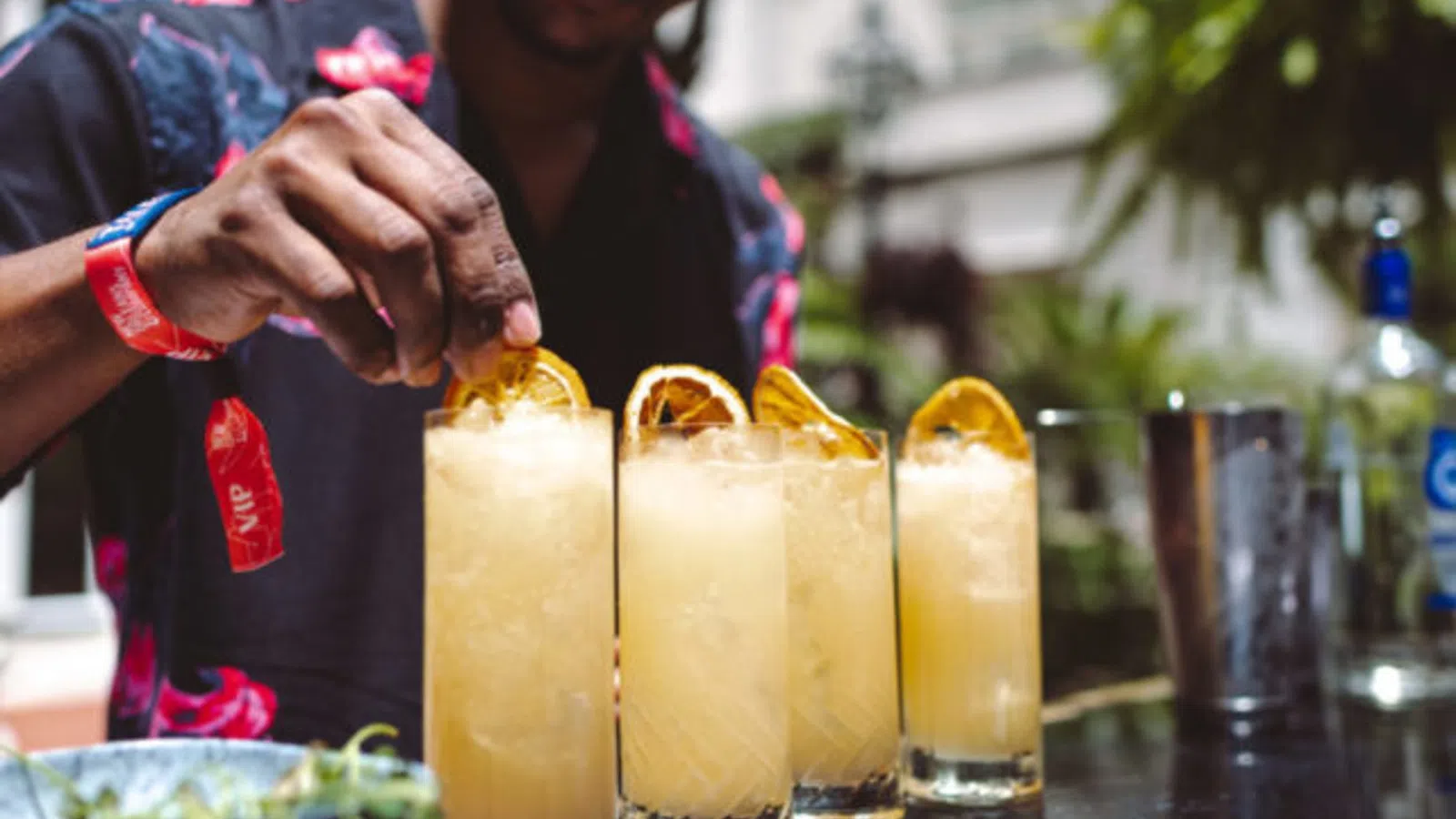 a person holding a drink