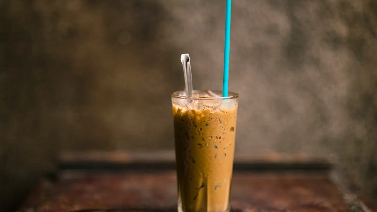 a glass with a straw and a straw in it