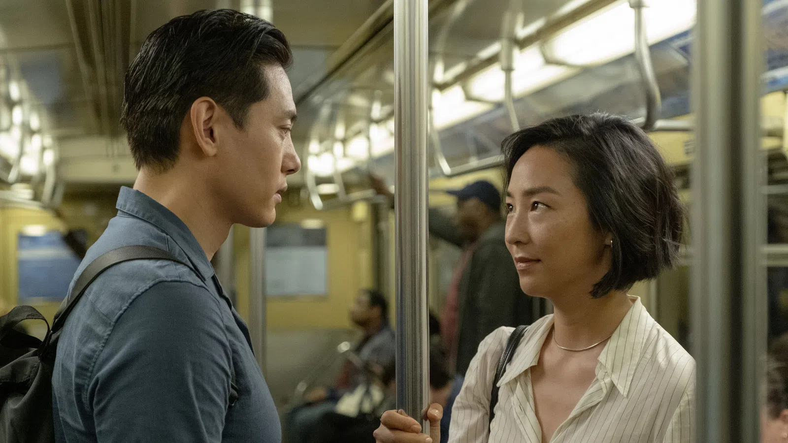 a man and a woman on a bus