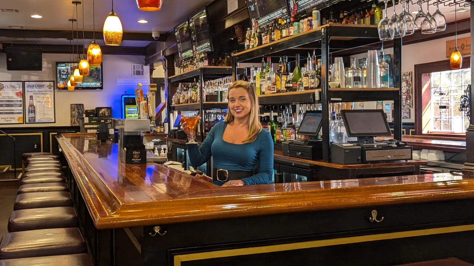a person sitting at a bar