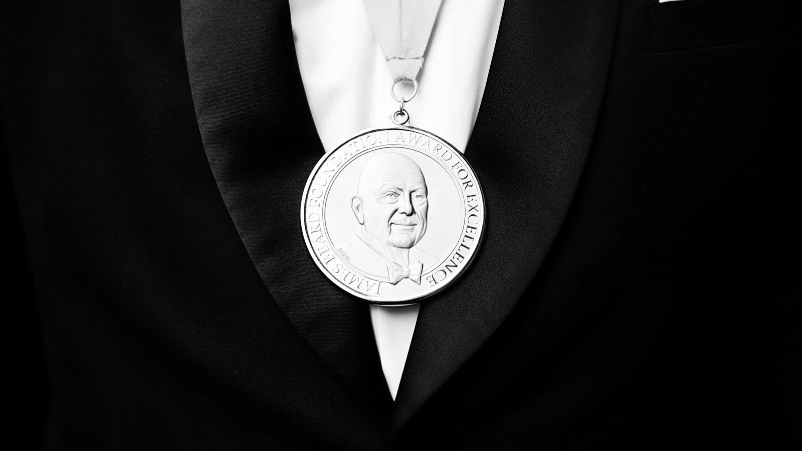 a person wearing a suit and tie