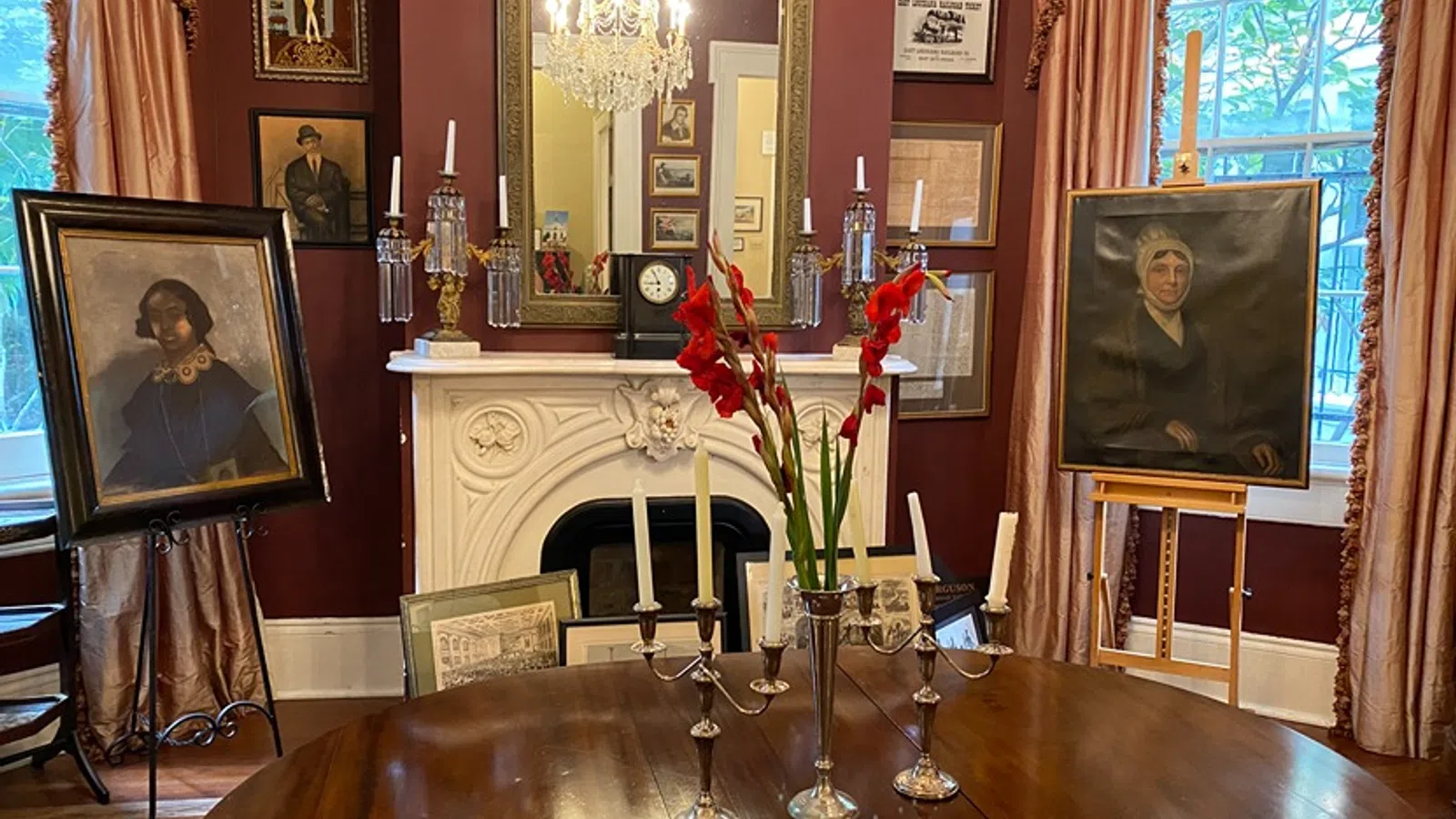 a table with candles and flowers on it