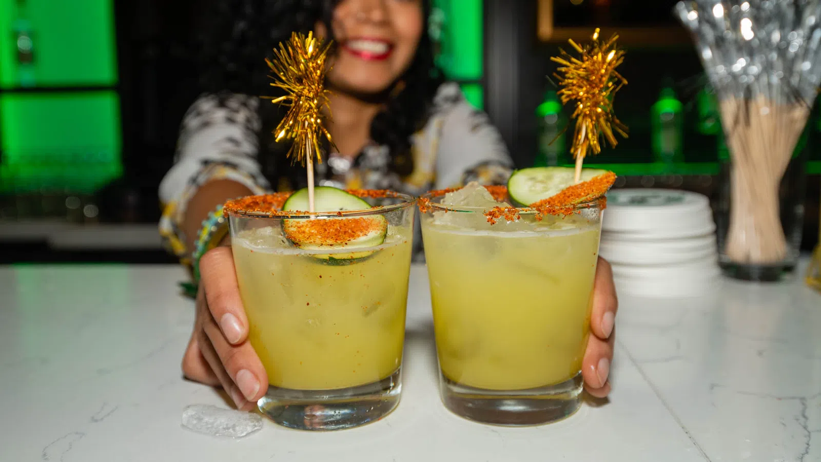 a person holding a drink