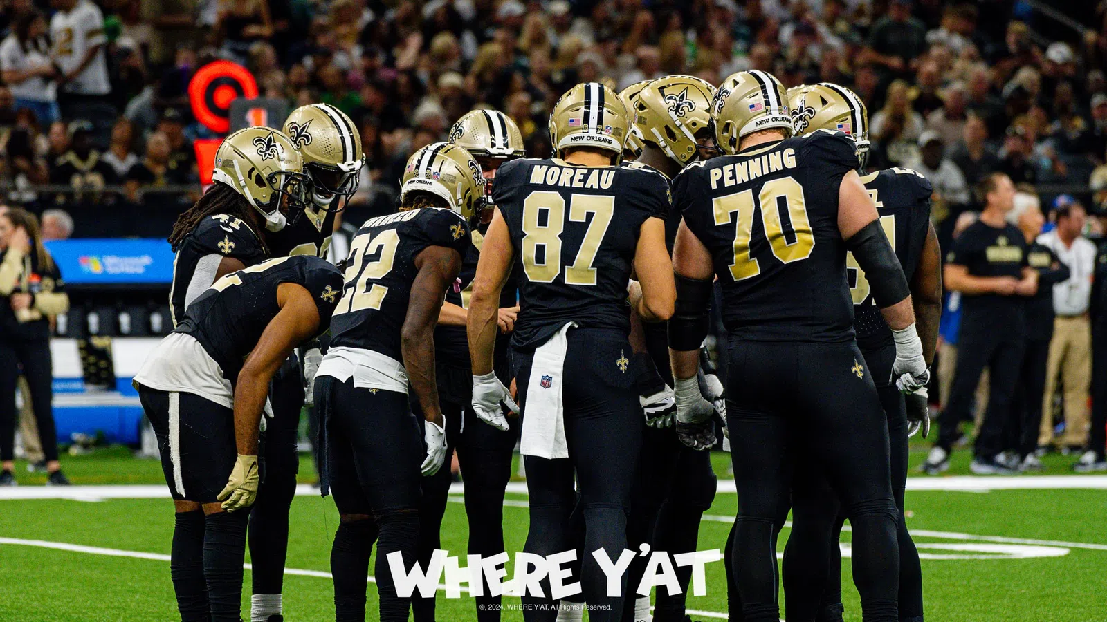 a group of football players on a field