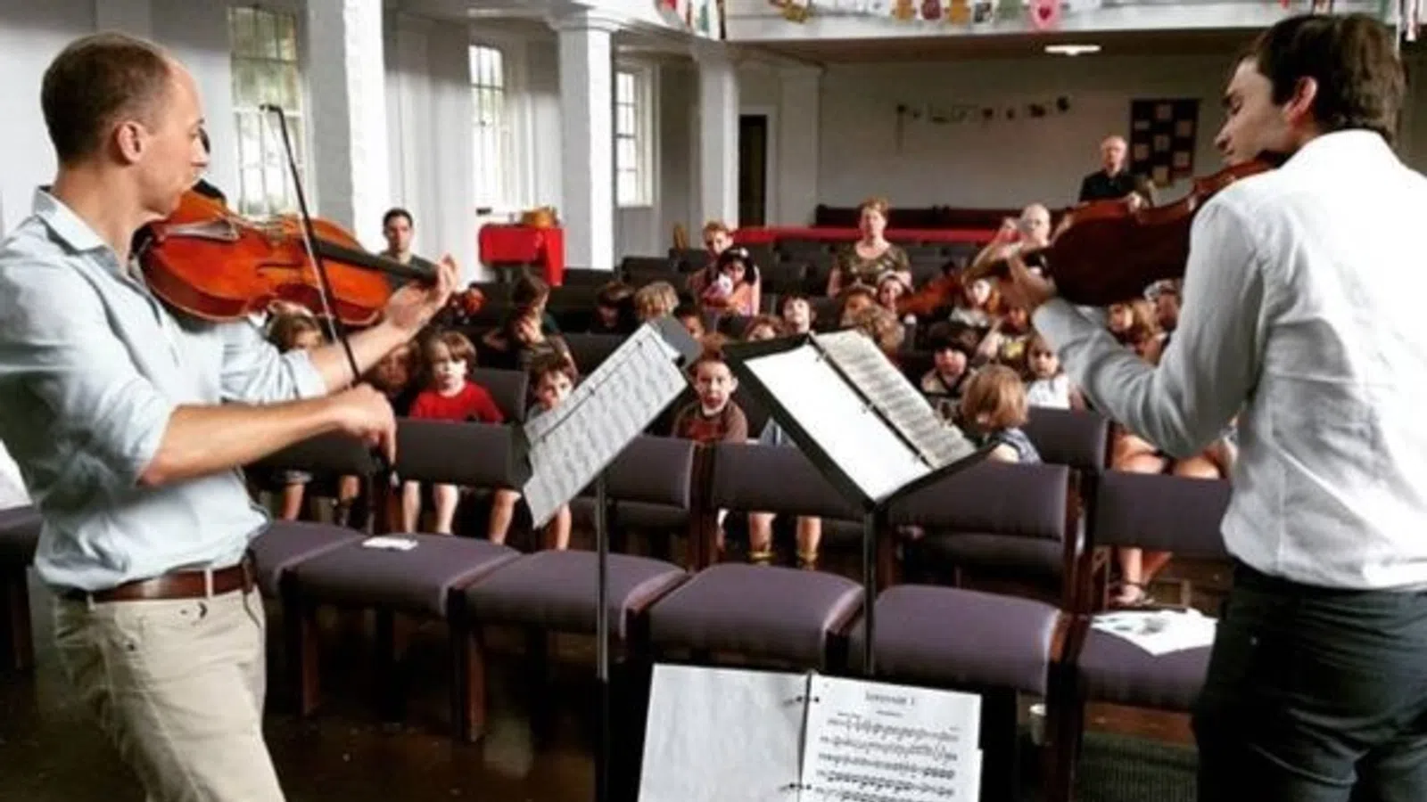 a group of people playing instruments