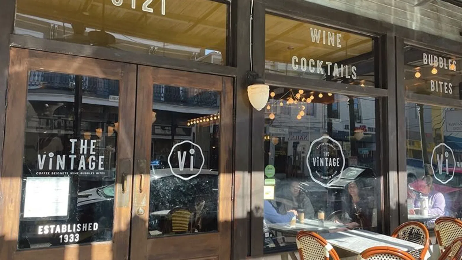 a restaurant with a table and chairs