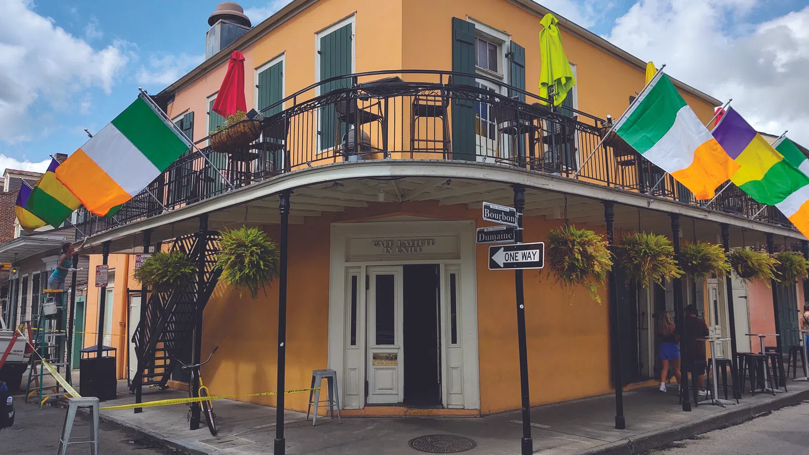 a building with flags on the roof