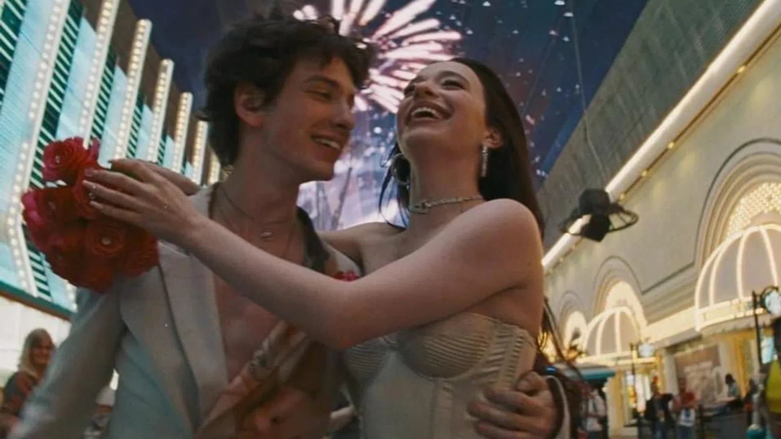 a man and woman holding each other