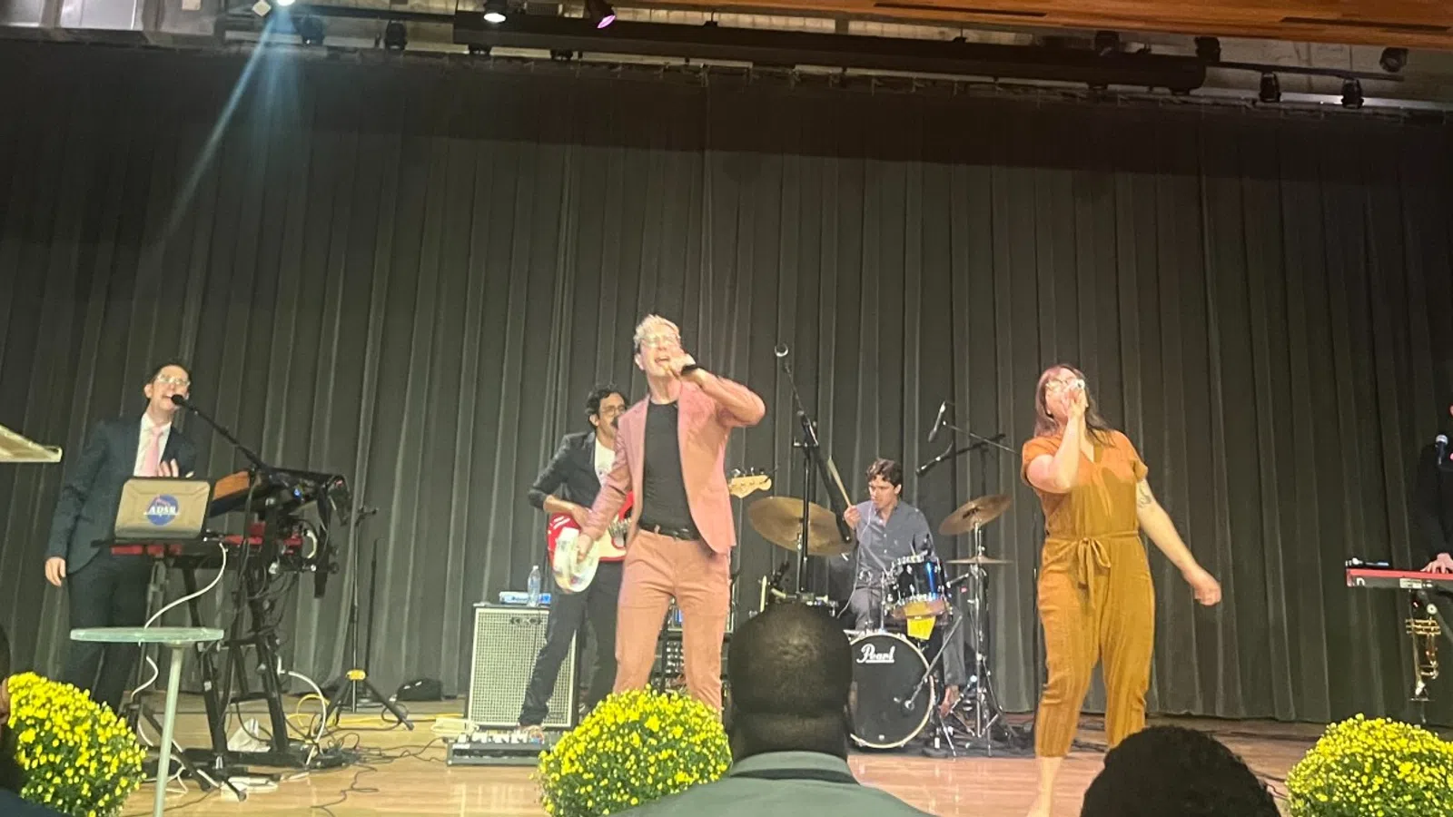 a group of people on a stage