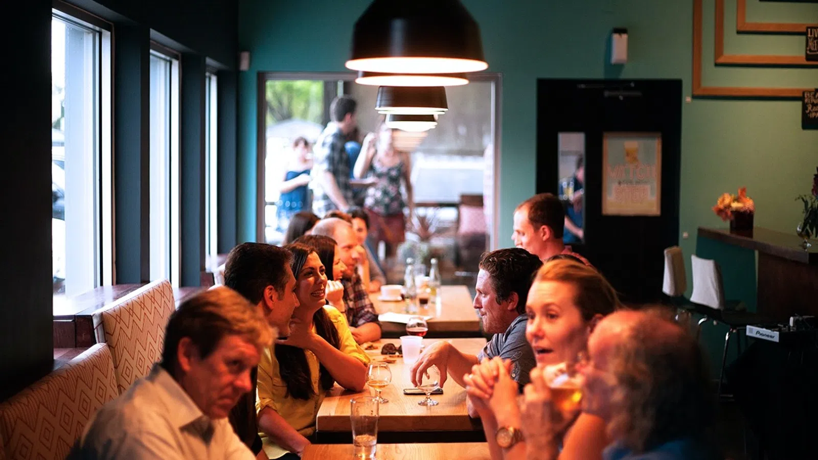 a group of people sitting at a table