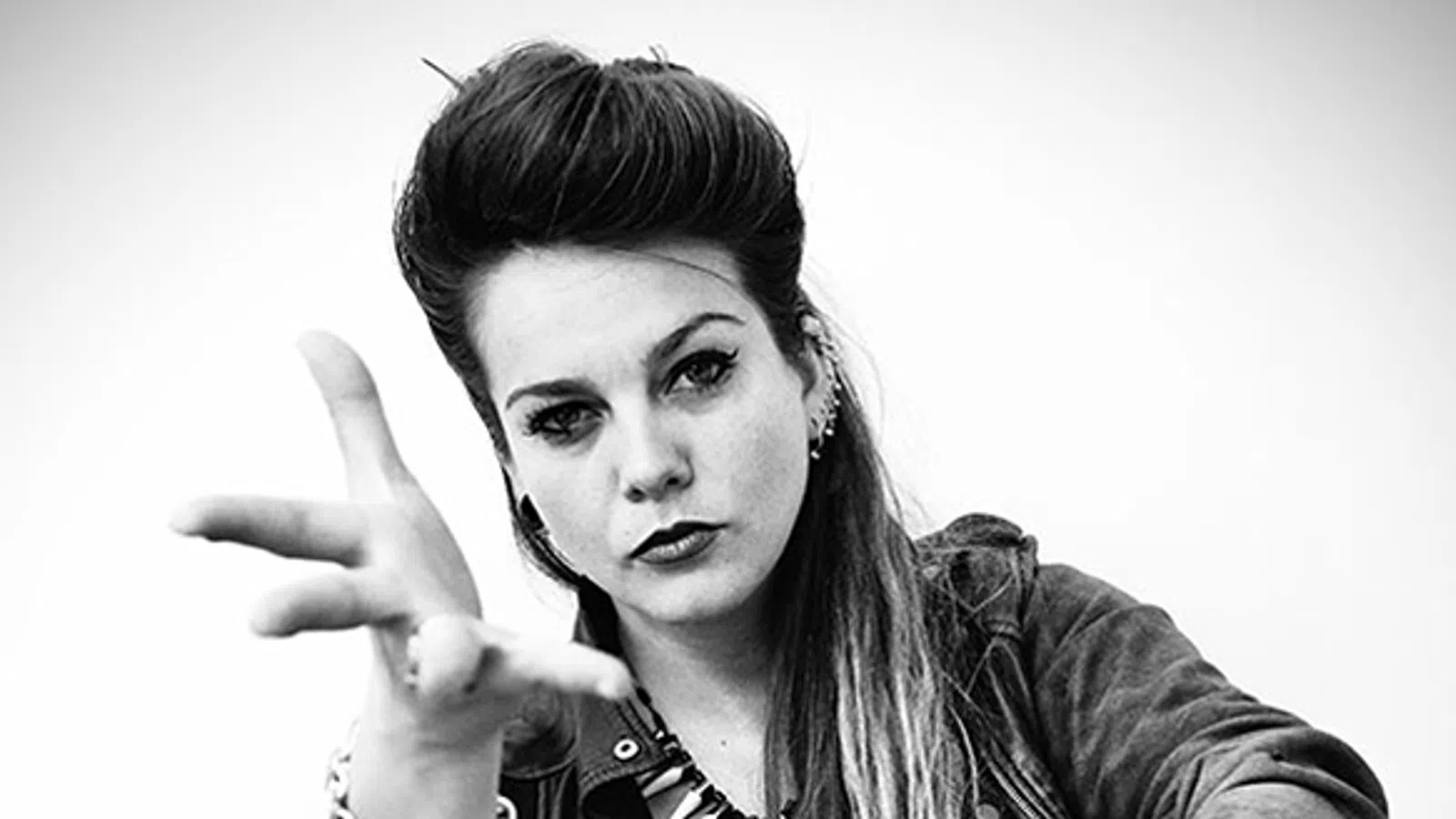 a woman pointing her finger