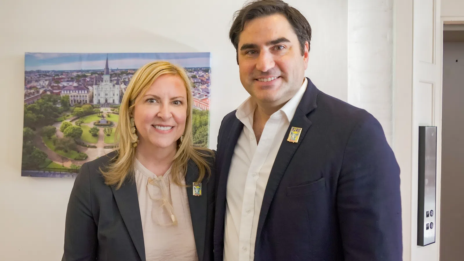 a man and a woman smiling