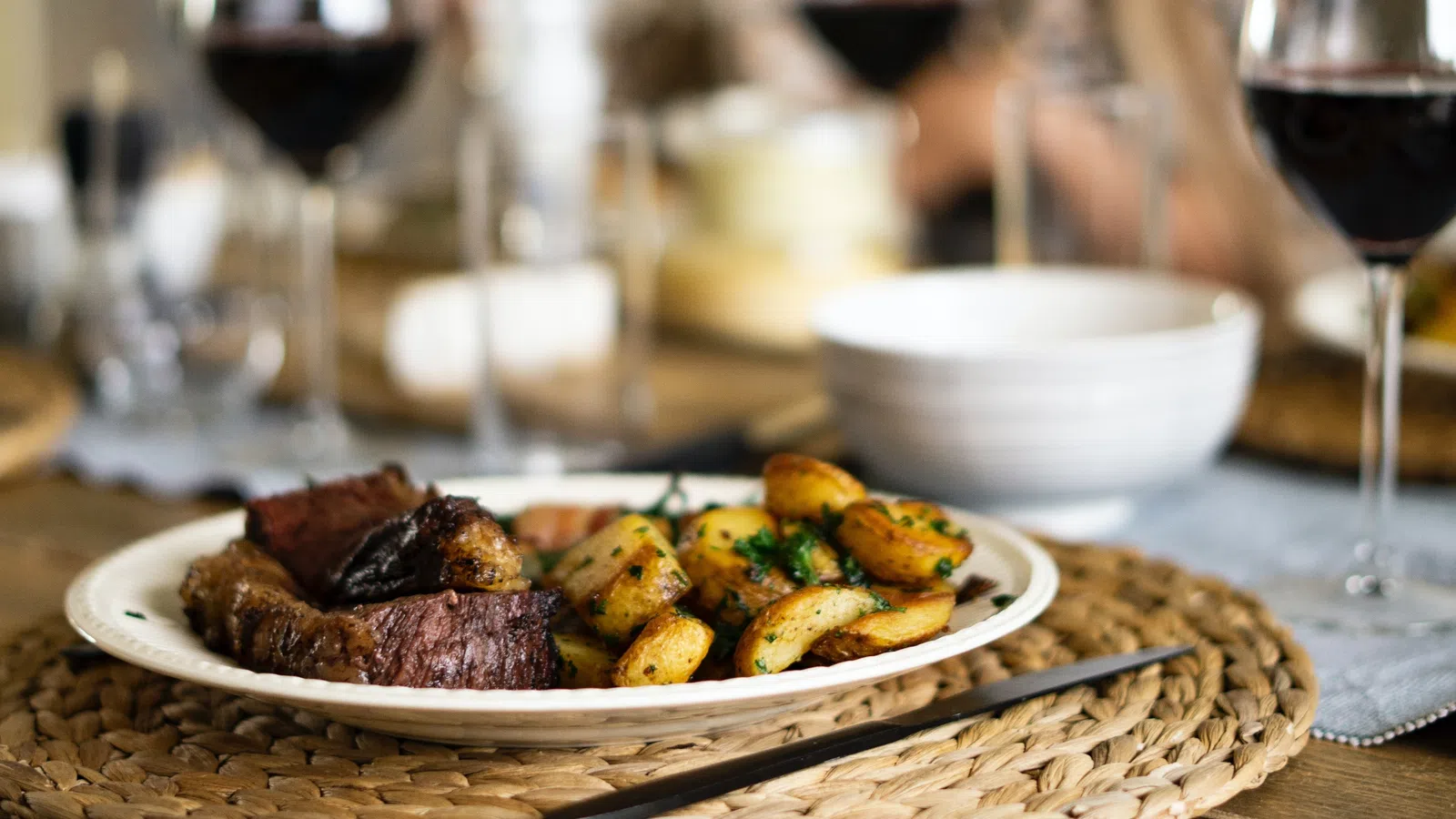 a plate of food and wine