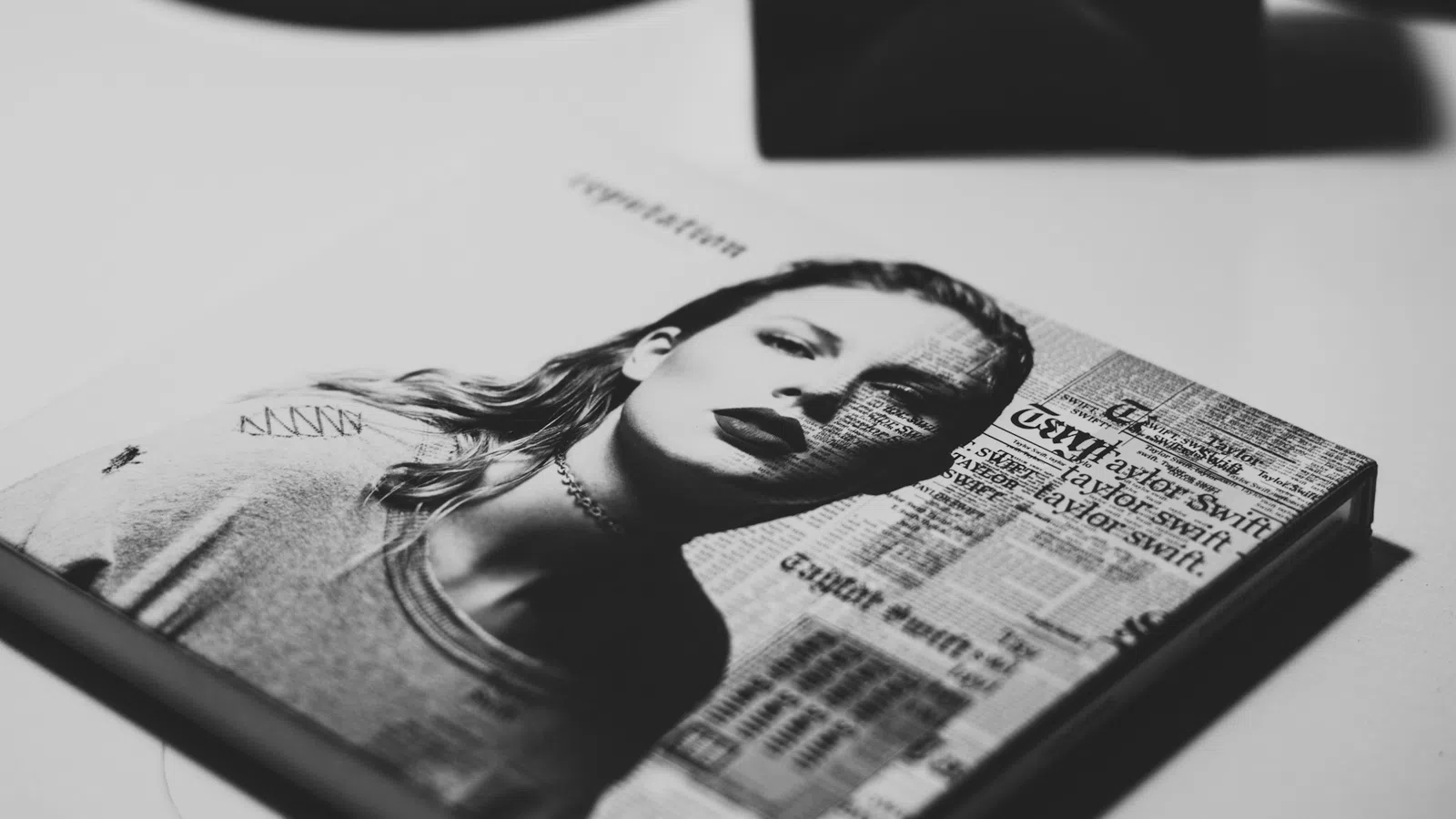 a woman's face on a book