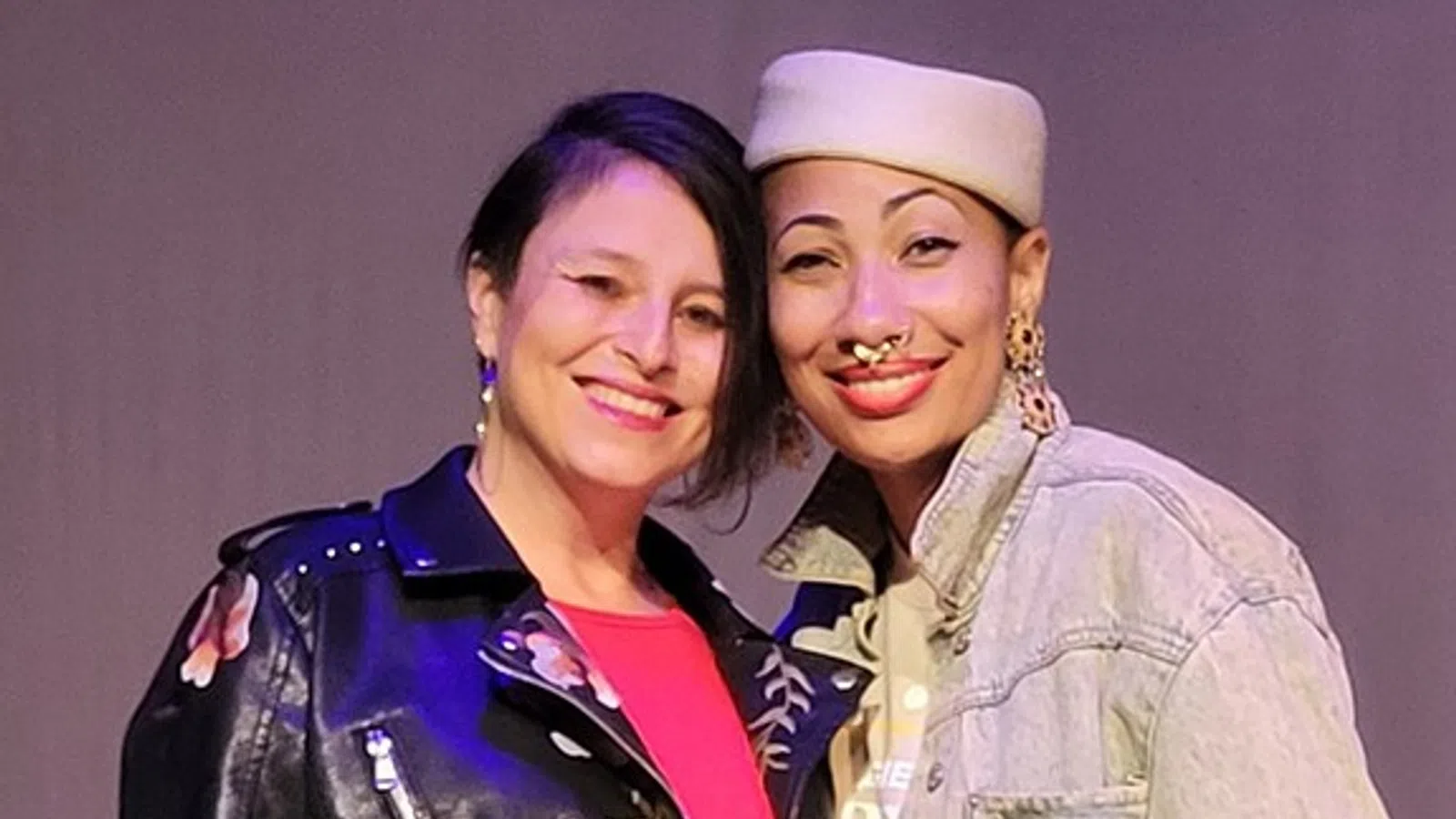 a couple of women smiling