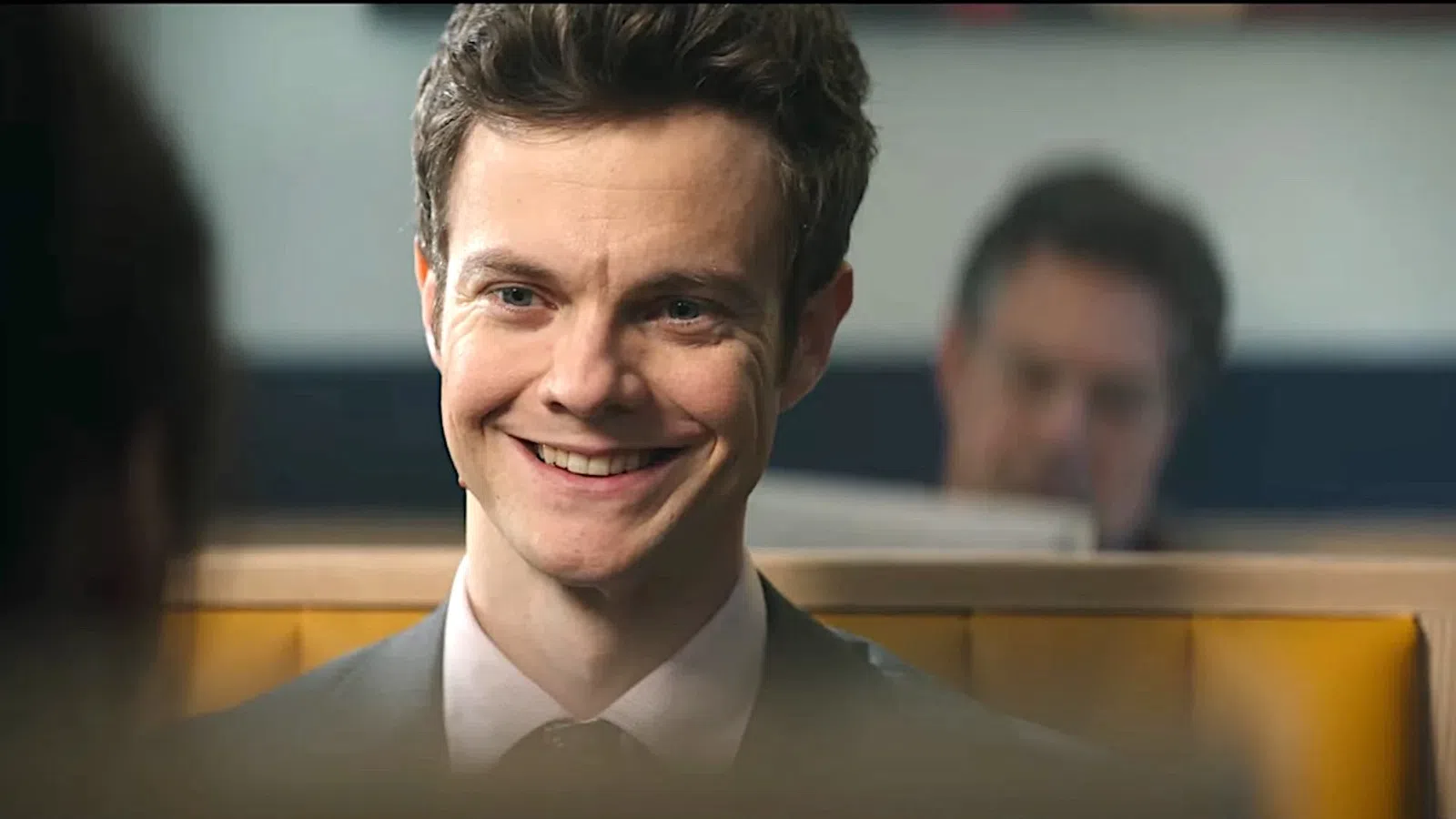 Jack Quaid smiling at the camera
