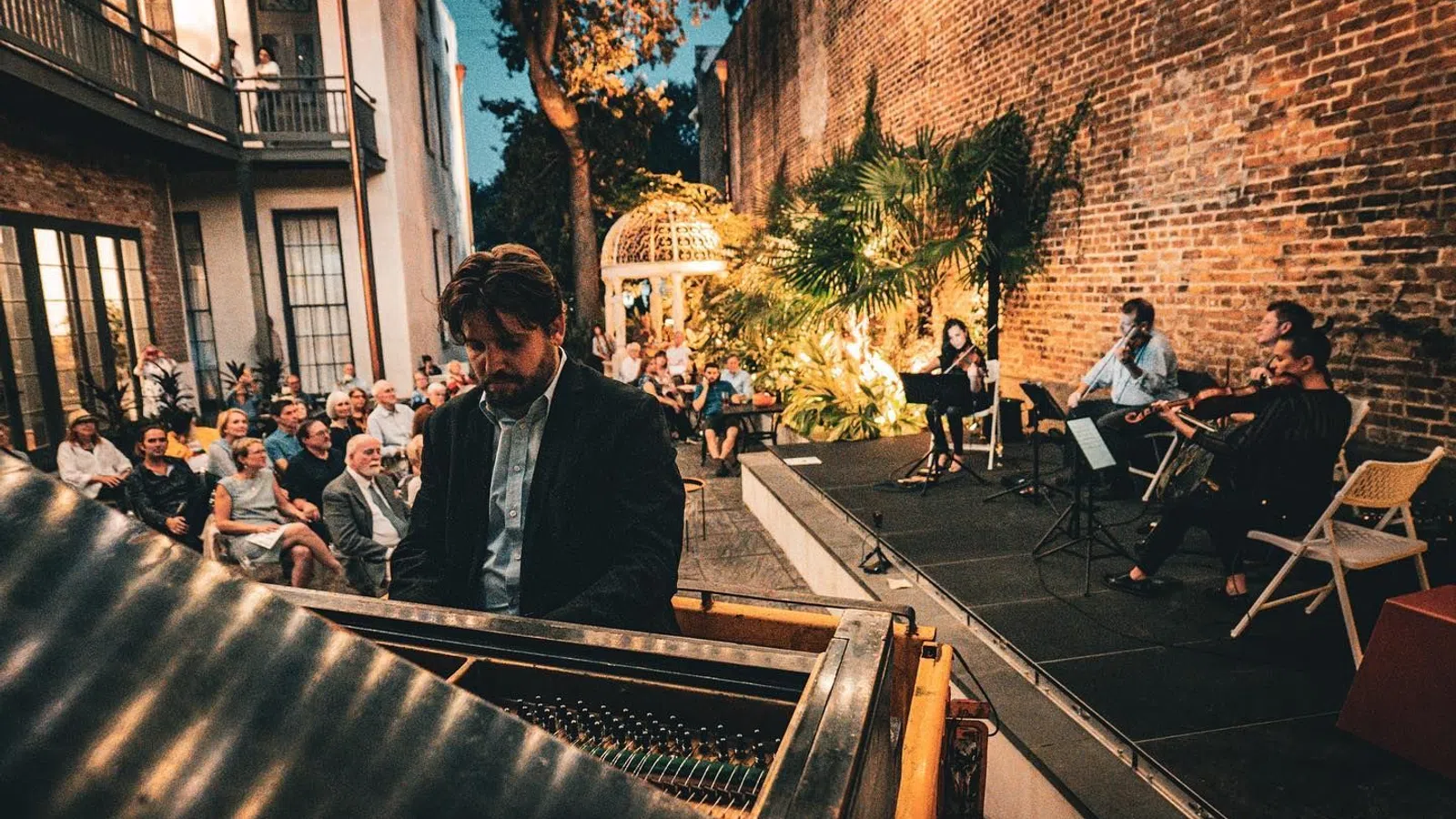 a group of people sitting outside