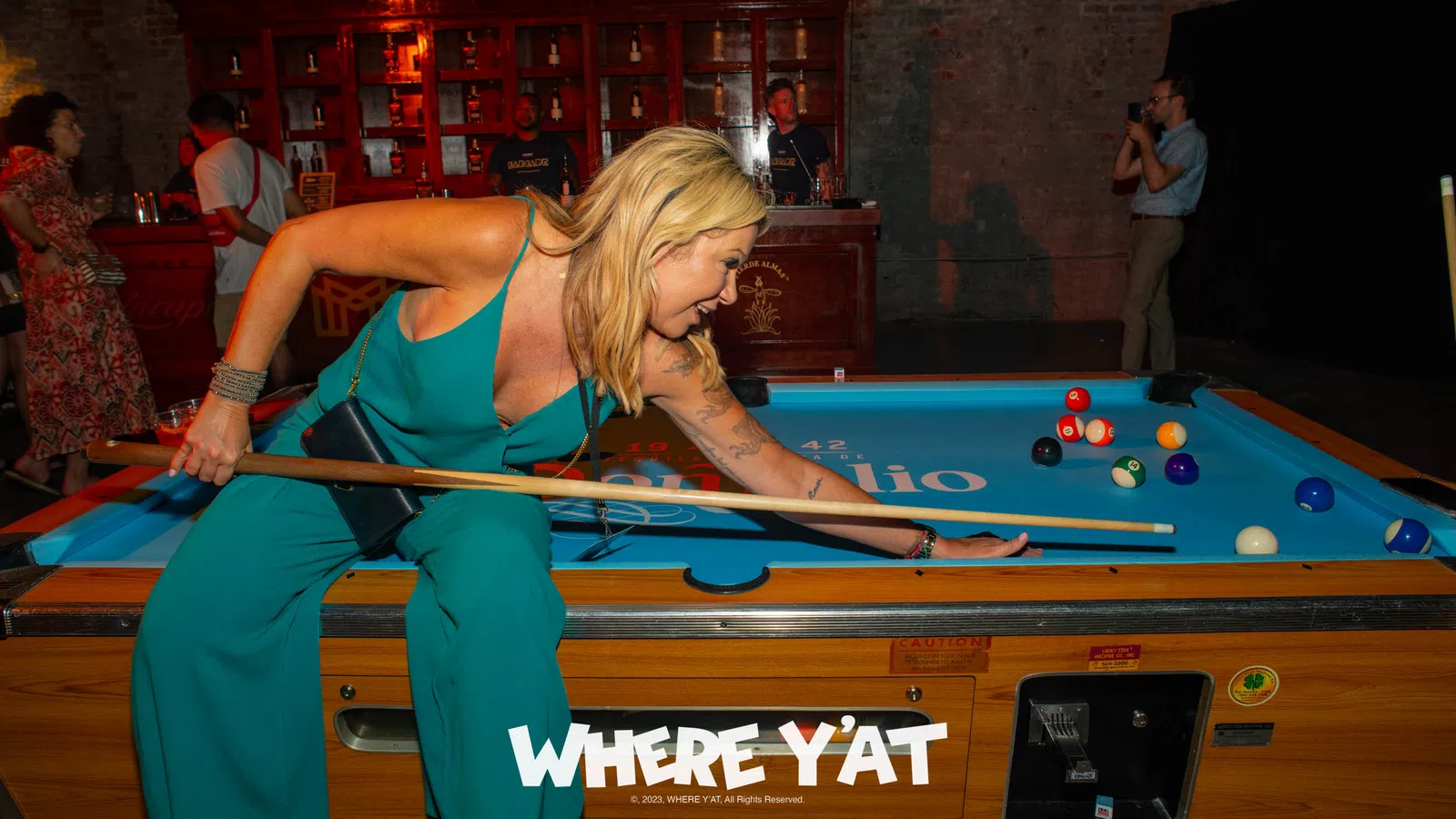 a person playing pool