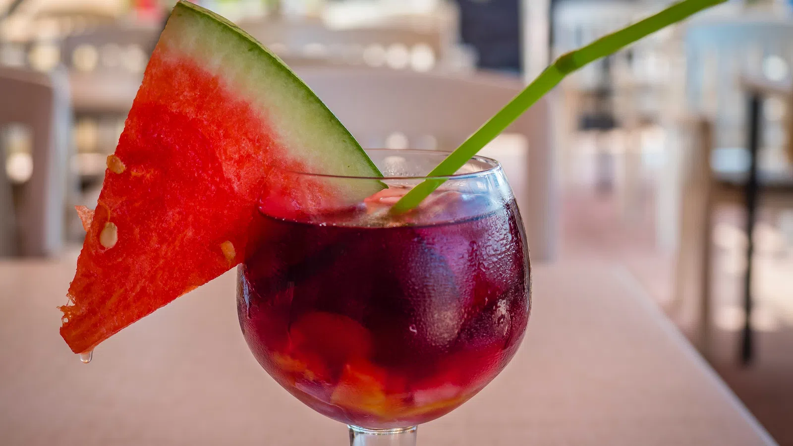 a glass with a drink in it